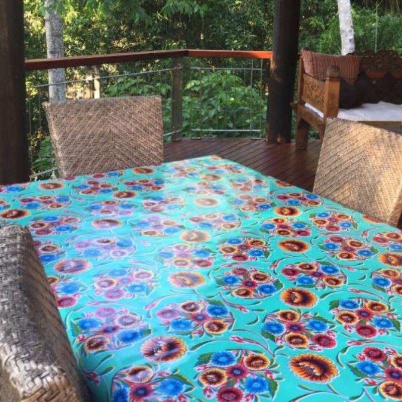 Ben Elke Mexican oilcloth tablecloth 2.5m x 1.2m shown on a table. 