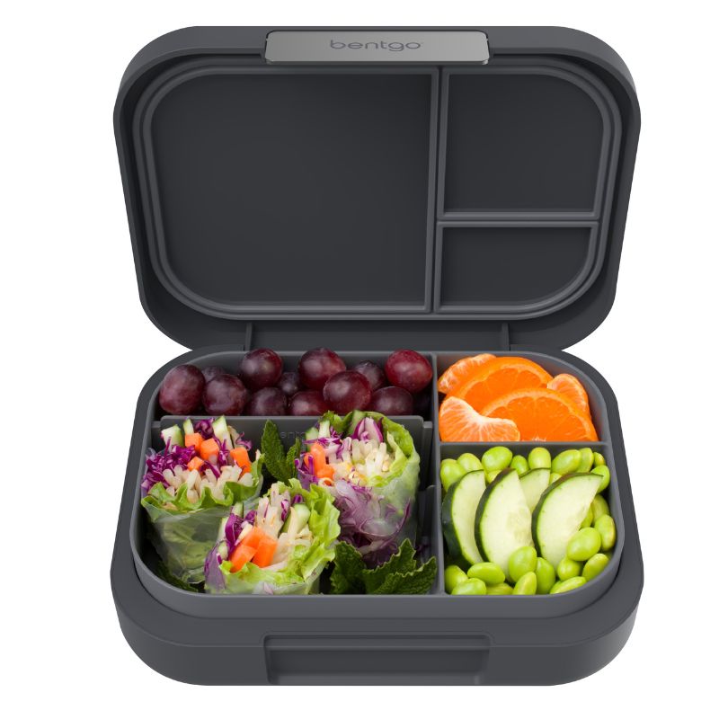 Bentgo modern lunch box - dark grey - shown open with food. 