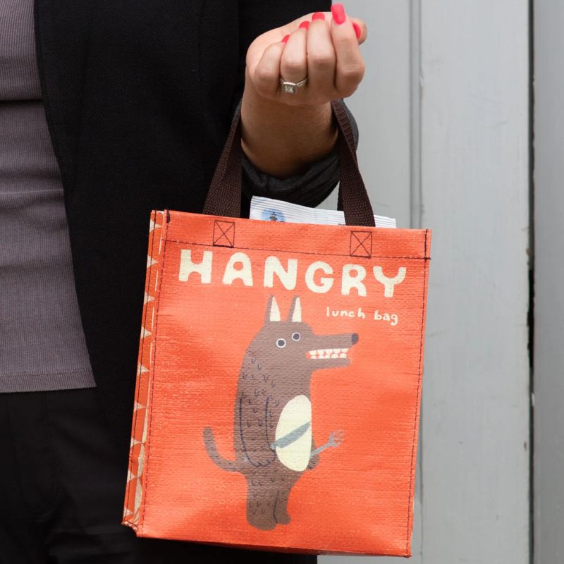 Blue Q Handy Tote Bag - woman holding a bag.