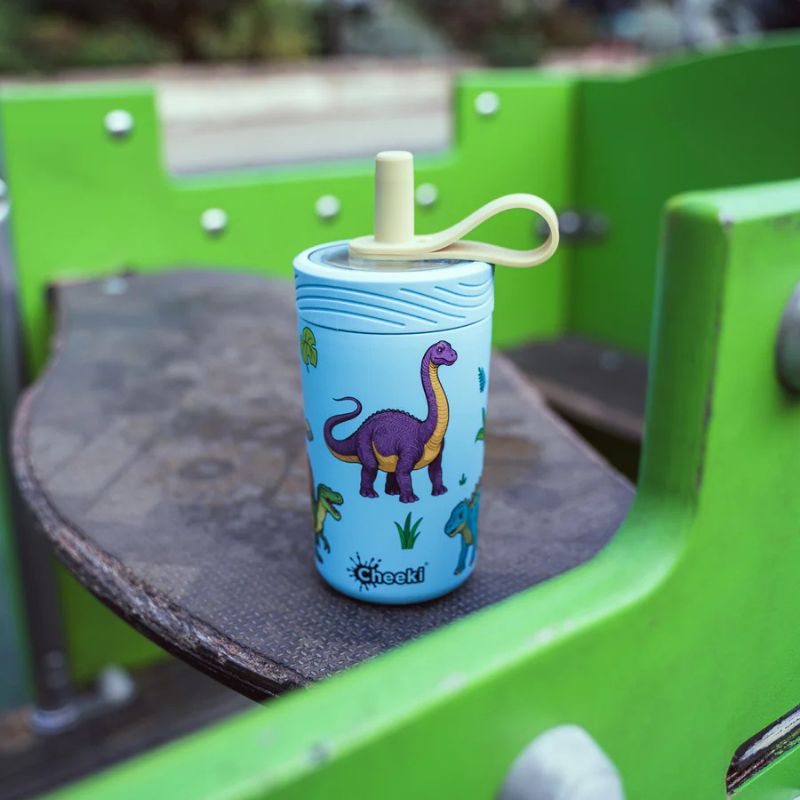 Cheeki 400ml insulated sippy cup - on a play equipment.