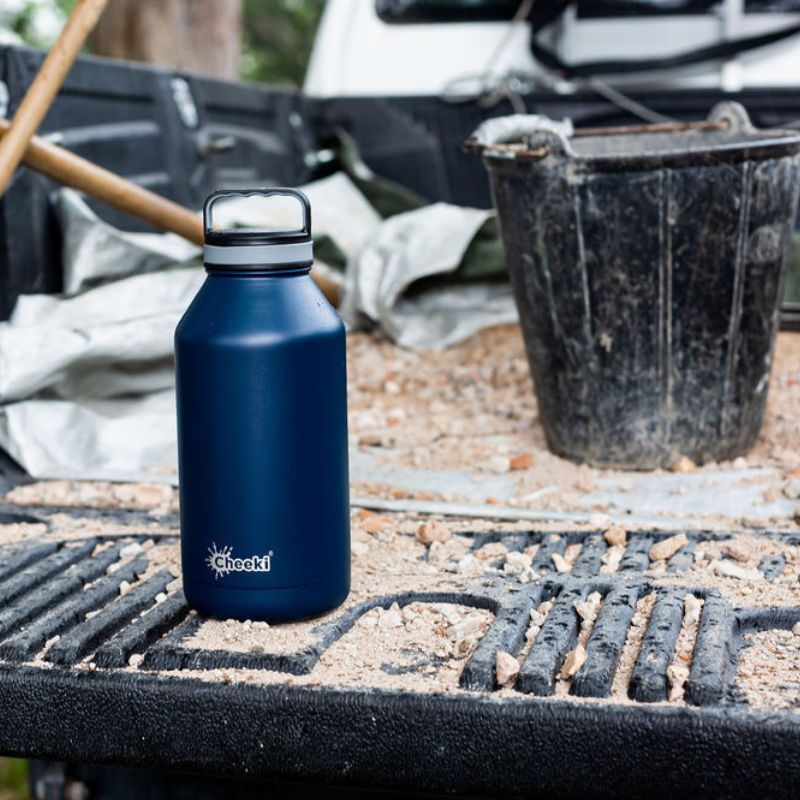 Cheeki Chiller 1.9L - Classic insulated stainless steel bottle - Navy - shown on the back of a Ute.