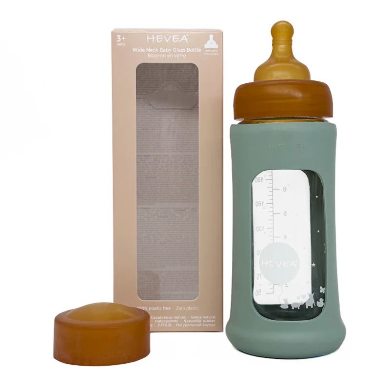 Hevea wide neck baby glass bottle with natural rubber sleeve and teat - 250ml - bottle and cover showing outside box.