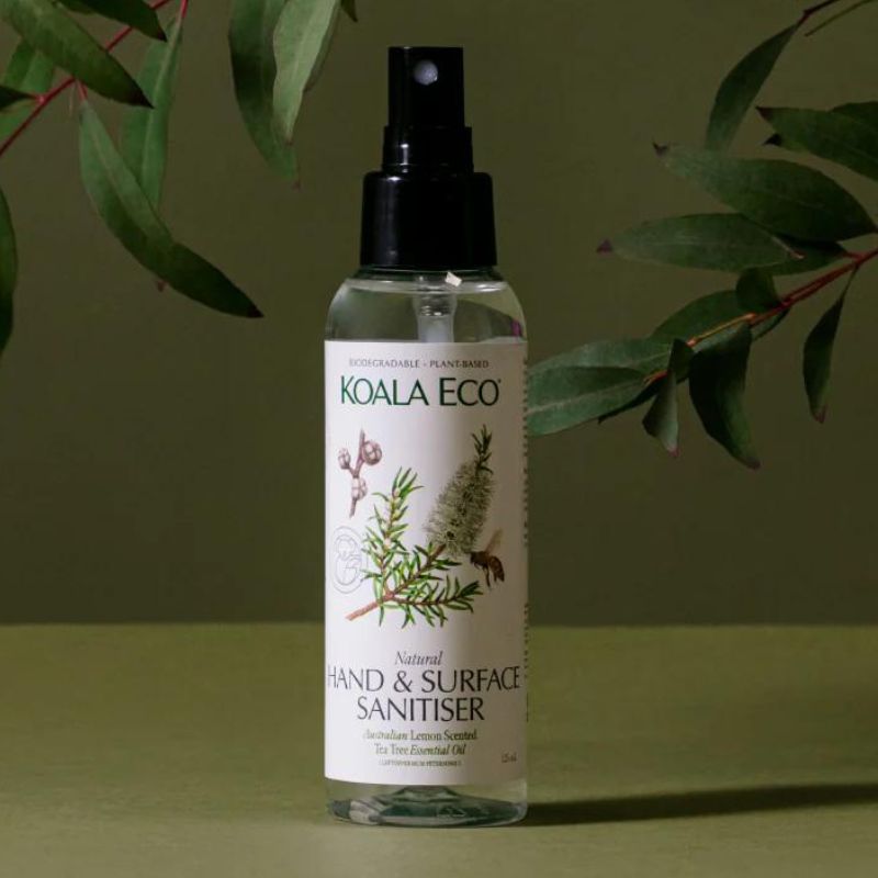 Koala Eco - hand and surface spray - Lemon Scented Tea Tree - 125ml - with tree branch in back ground.