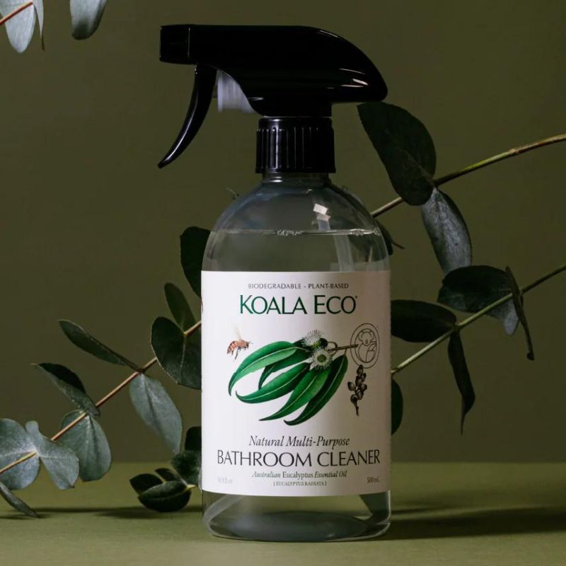 Koala Eco natural bathroom cleaner - 500ml bottle with pump - dark background and eucalyptus leaves.