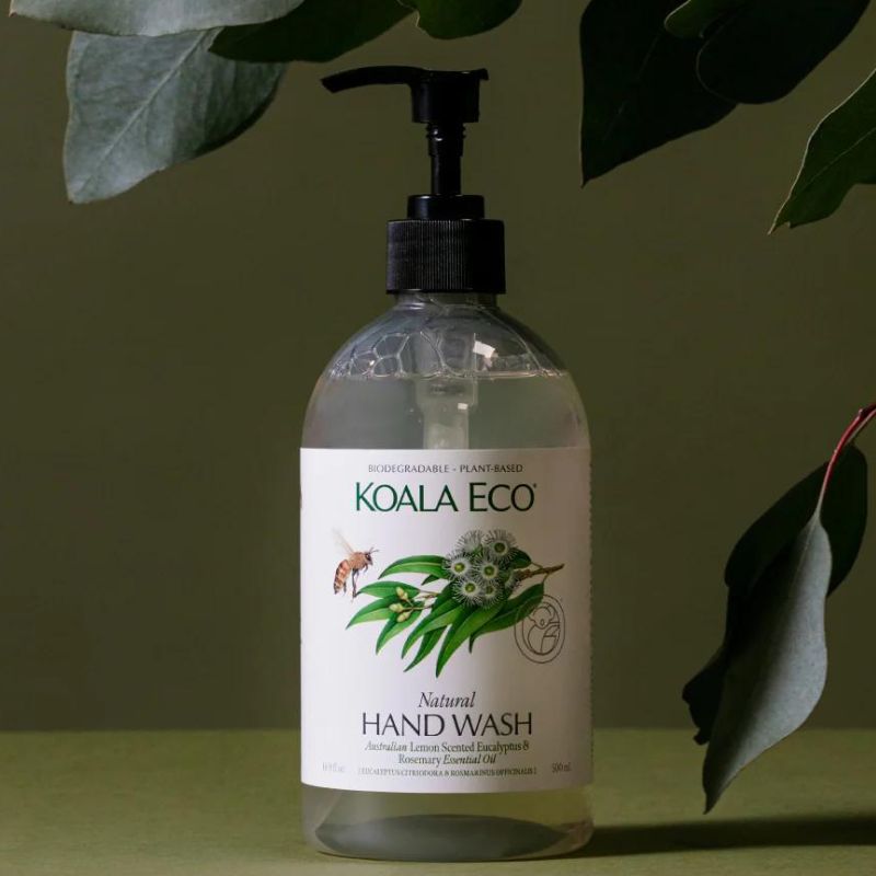Koala Eco natural handwash 500ml bottle with bump - dark background with eucalyptus leaves.