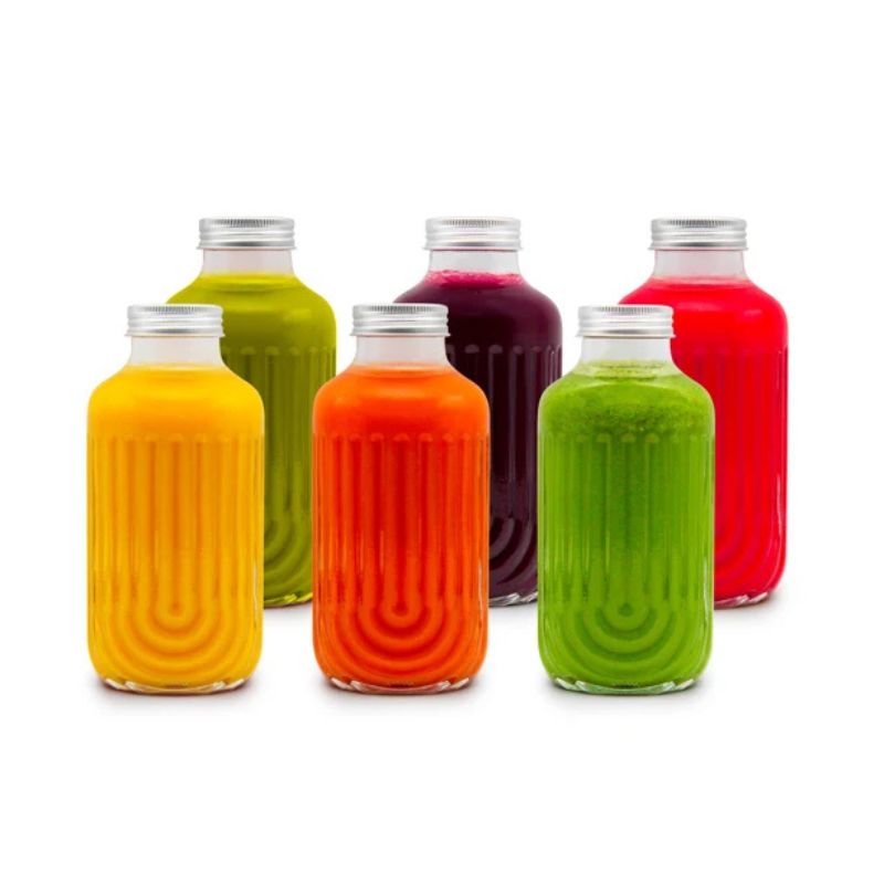 Melii Luxe Glass Fluted Juice Bottles - set of 6 clear 250ml bottles - showing with different coloured juice inside.