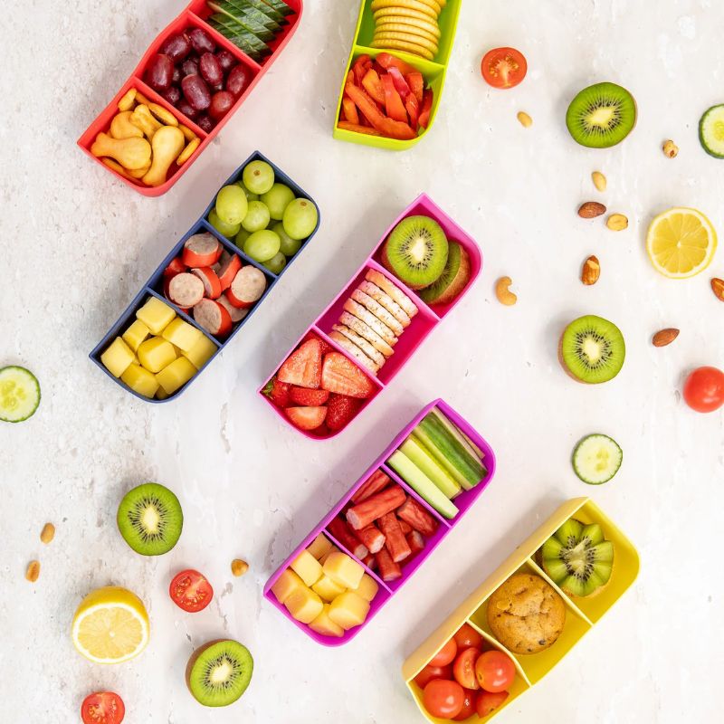 MontiiCo Feast Tray - silicone with 3 compartments - shown with different options of food.