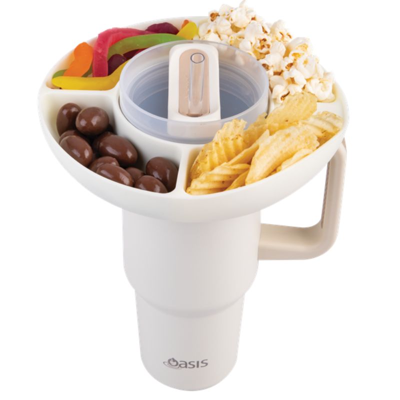 Silicone snack bowl to put on top of the Oasis commuter travel tumbler - shown with snacks on tumbler. 