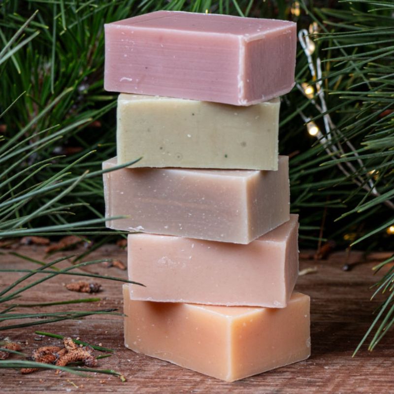 Washpool goats milk soap with shea butter - mixed soap bars stacked on top of each other.