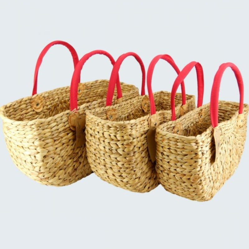 Water Hyacinth rectangle basket with red canvas handle - small, medium and large basket next to each other.