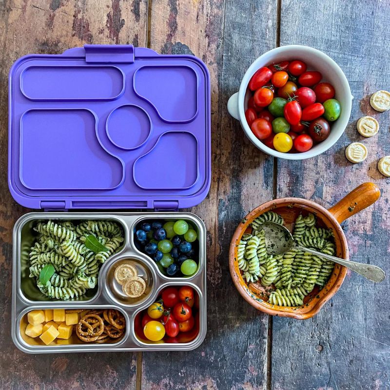 Yumbox Presto stainless steel leakproof bento lunch box - shown open with food. 