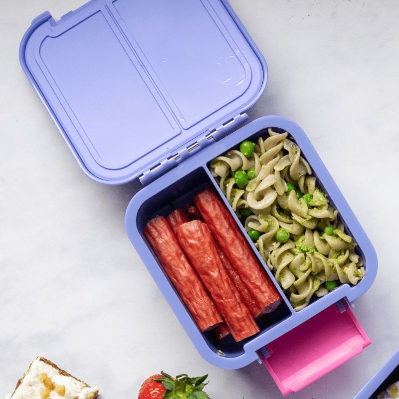 Little Lunch Box Co Two - leakproof snack box with 2 compartments - shown open with food. 