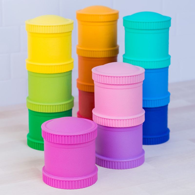 Replay snack stacks containers - lots of mixed colours stacked on top of each other. 