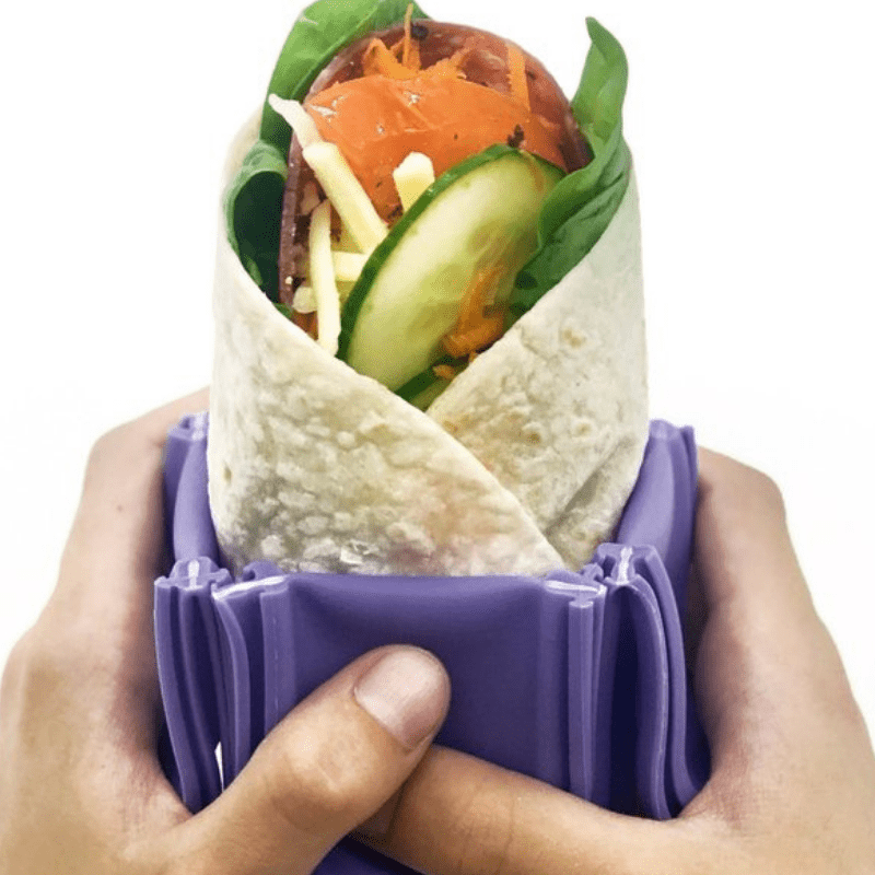 Wrap'd silicone wrap holder in purple - open with food.